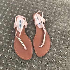 Steve Madden nude and gold sandals.