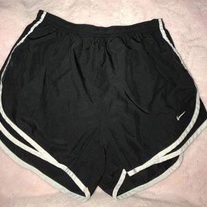 Black Nike running shorts