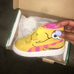 Worn Sesame Street pumas