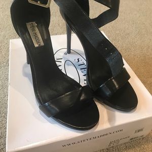 Black leather heeled sandals