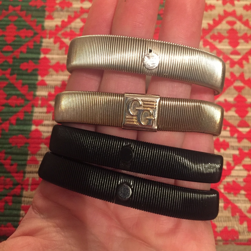 Vintage set of metal coil sleeve garters