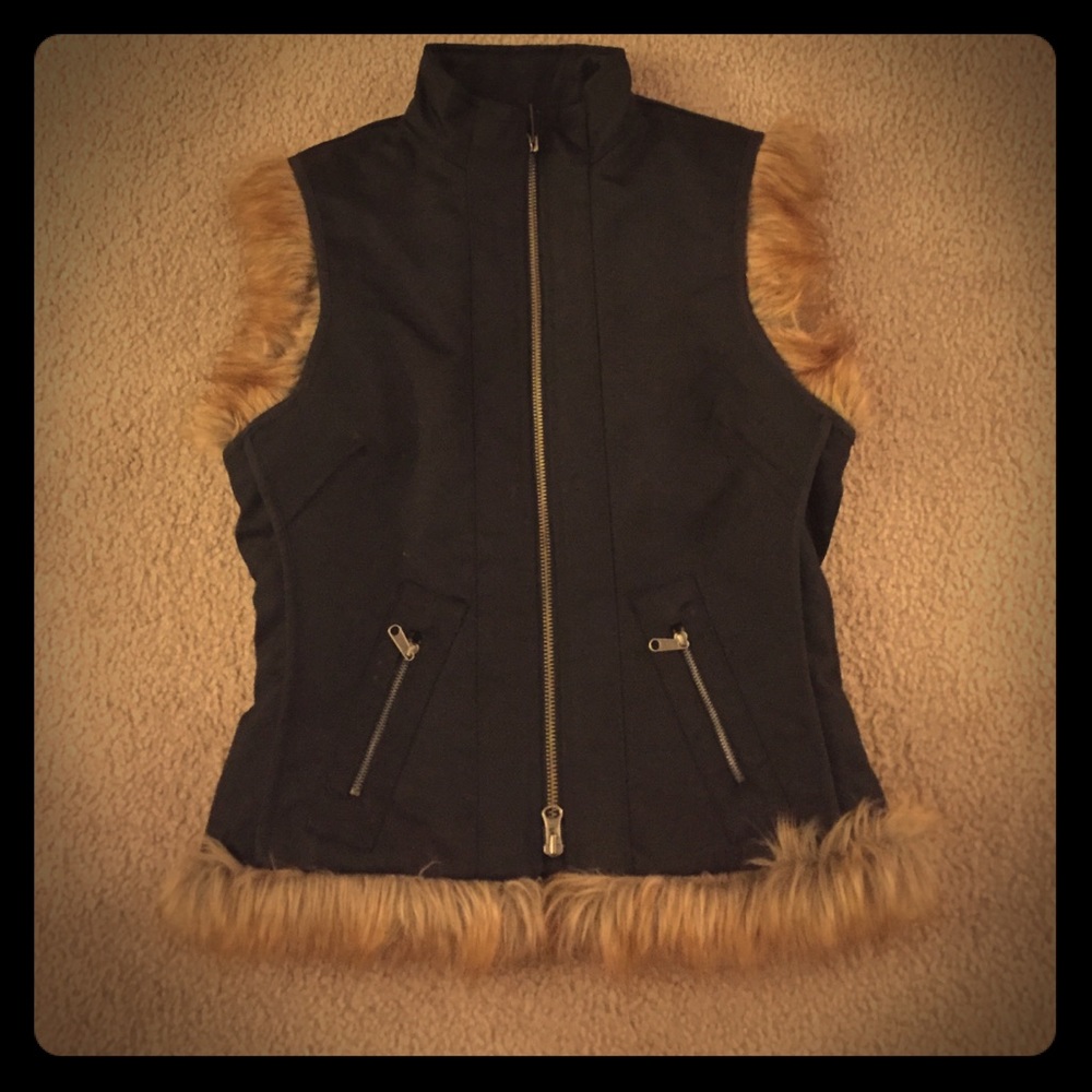 Black faux fur vest.