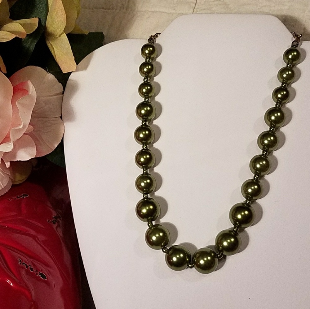 Green" Pearls" graduated in size