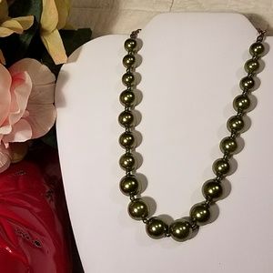 Green" Pearls" graduated in size