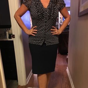 Women's INC polka dot blouse and matching skirt.