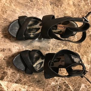 Black wedge heels.