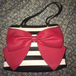 Purse with a pink bow