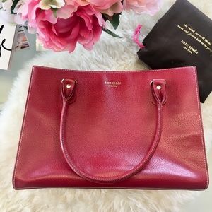 Red vintage Kate Spade with polka dot interior