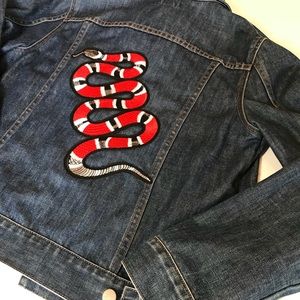 jean jacket with snake on back