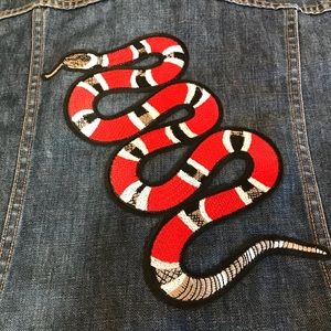 jean jacket with snake on back