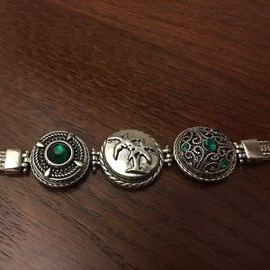 Silver and emerald colored stone bracelet