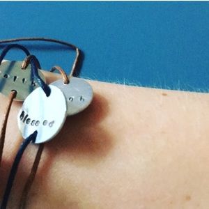 Stamped and messaged bracelets