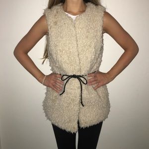 Faux fur vest with black belt