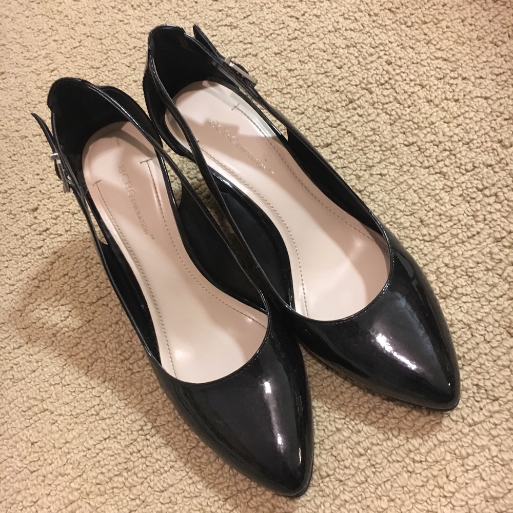 Black Patent leather Pumps by BCBG.  Size 9 / 39