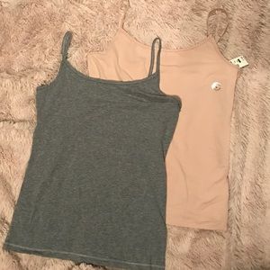 Two Aeropastale tanks  size Large. One with tags