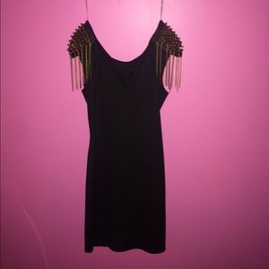 A black chain dress