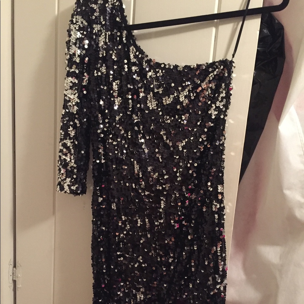 Black and silver one shoulder sequin dress
