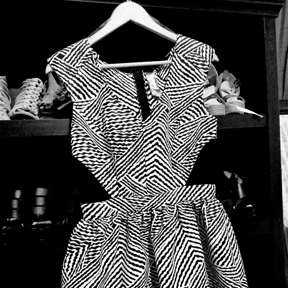 New with tags.  Black and white with side peekaboo