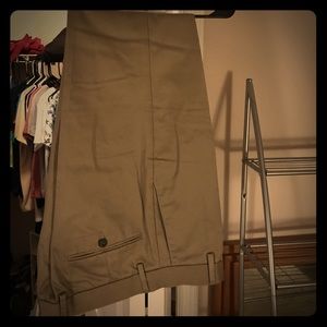 Brand new Khaki straight leg pants .