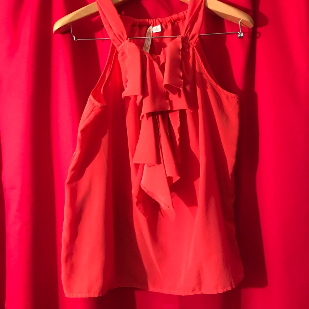 Orange ruffle blouse