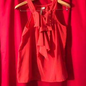 Orange ruffle blouse