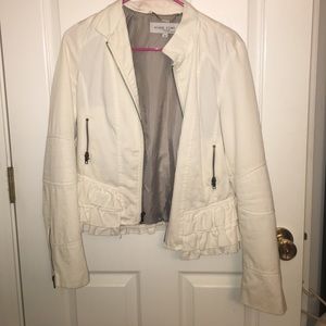 White jacket with ruffle detail
