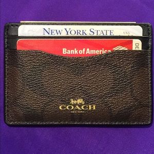 Coach Men’s leather metro wallet