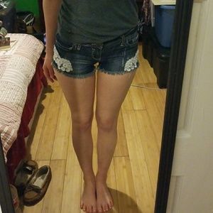 Lace detailed jean shorts