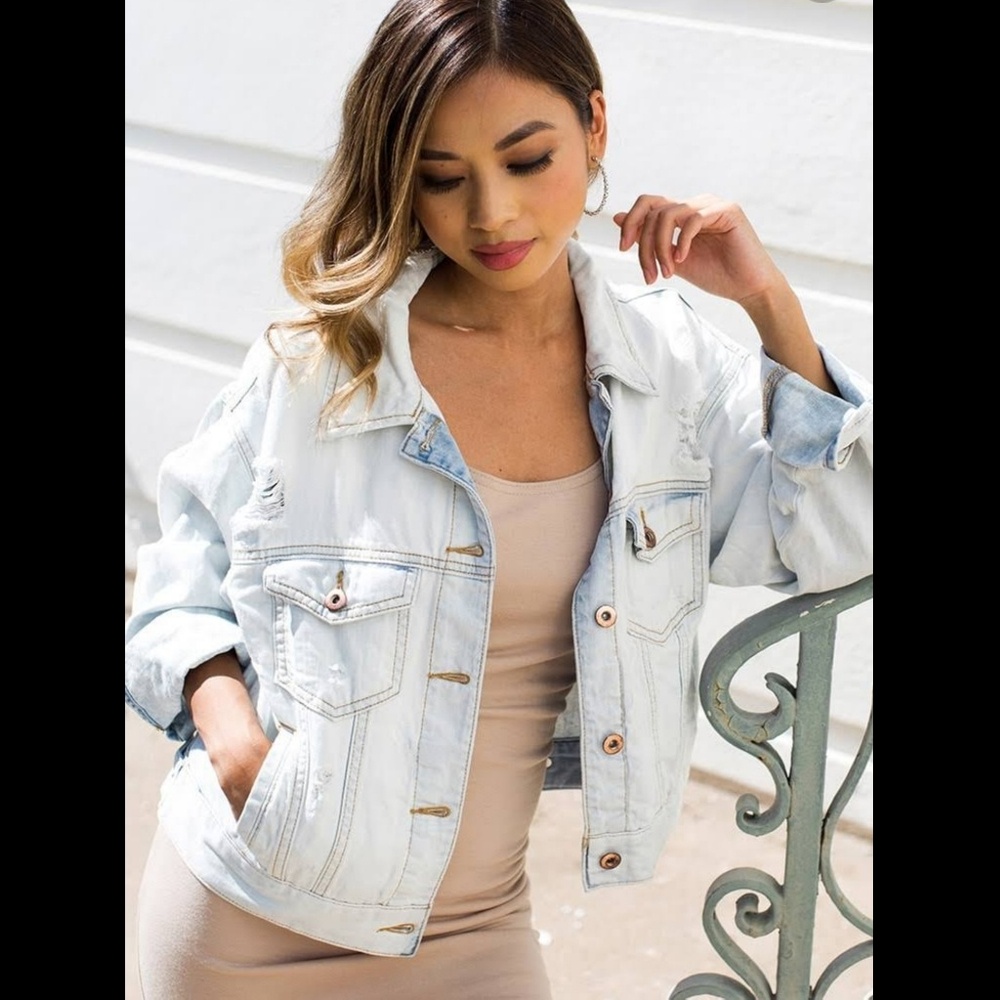 Distressed denim jacket