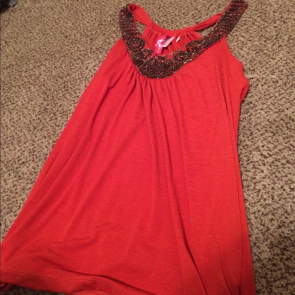 Sleeveless orange blouse