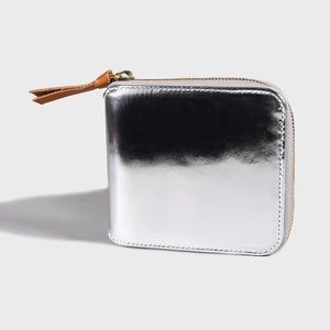 Clare V silver mirror Waller with pink lining.