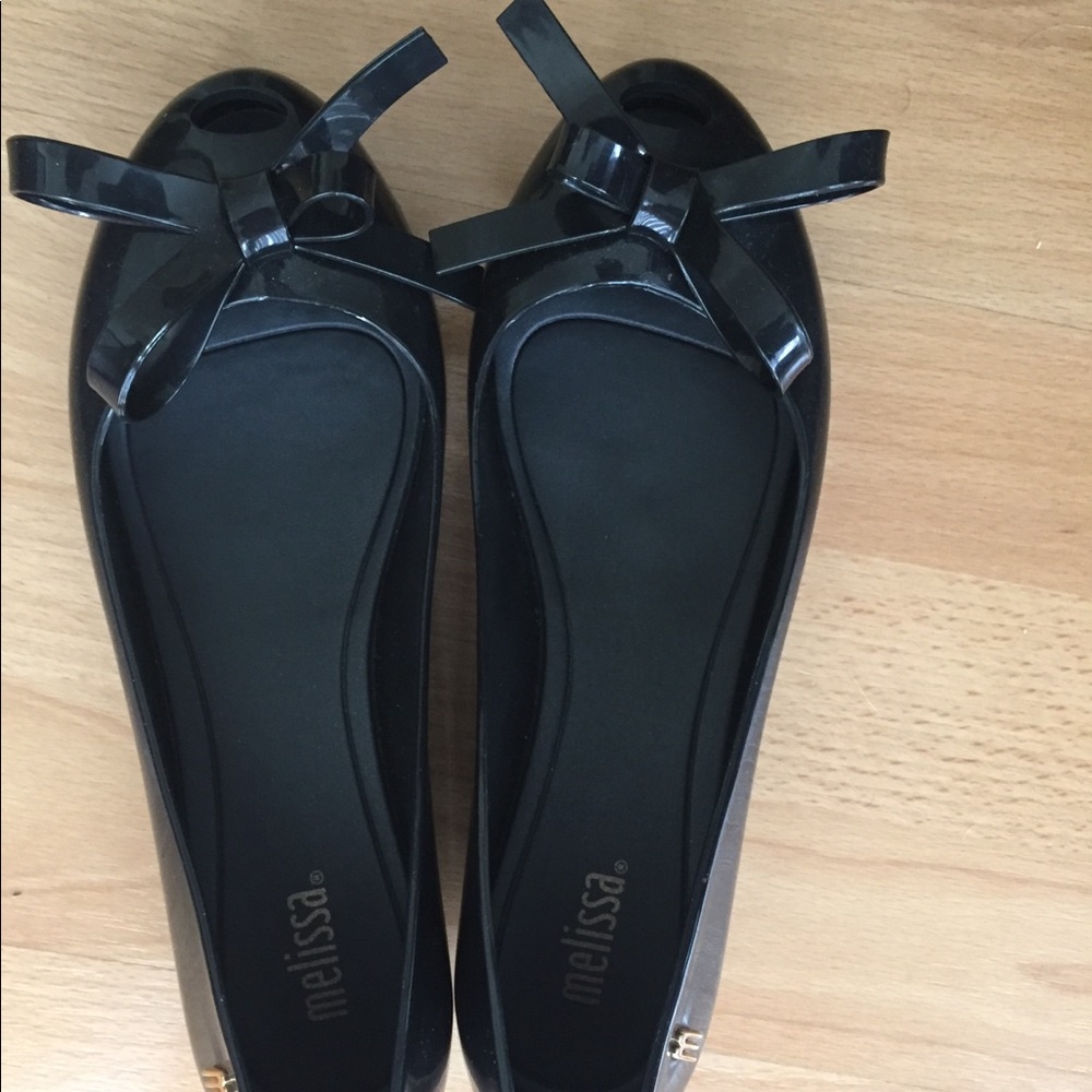 New Black Melissas size 6