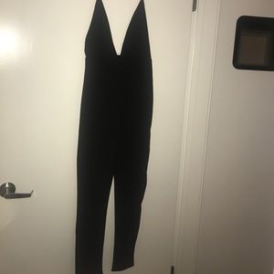 Black spaghetti strapped jump suit BRAND NEW