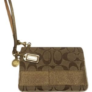 Coach wristlet in signature fabric
