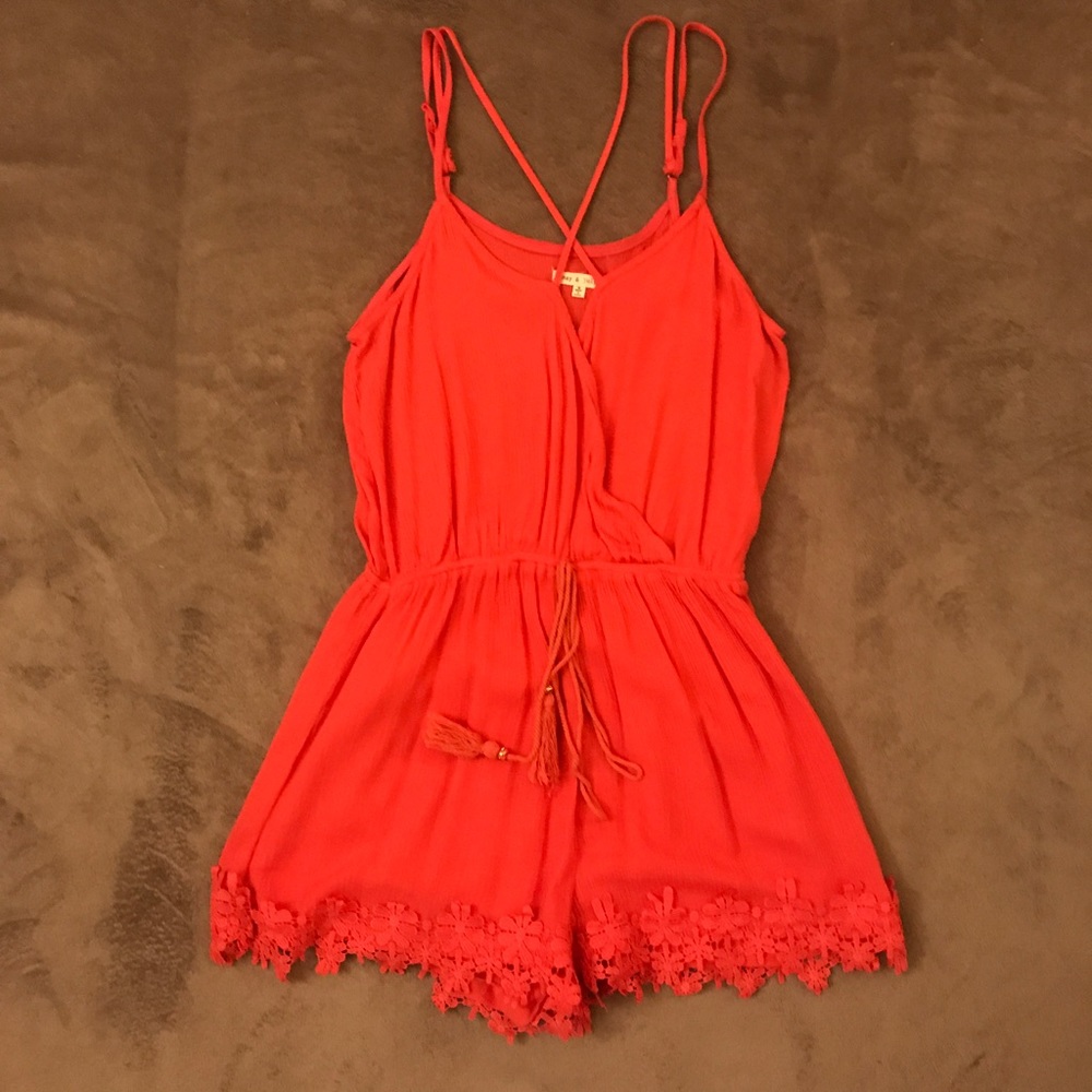 Coral romper size medium.