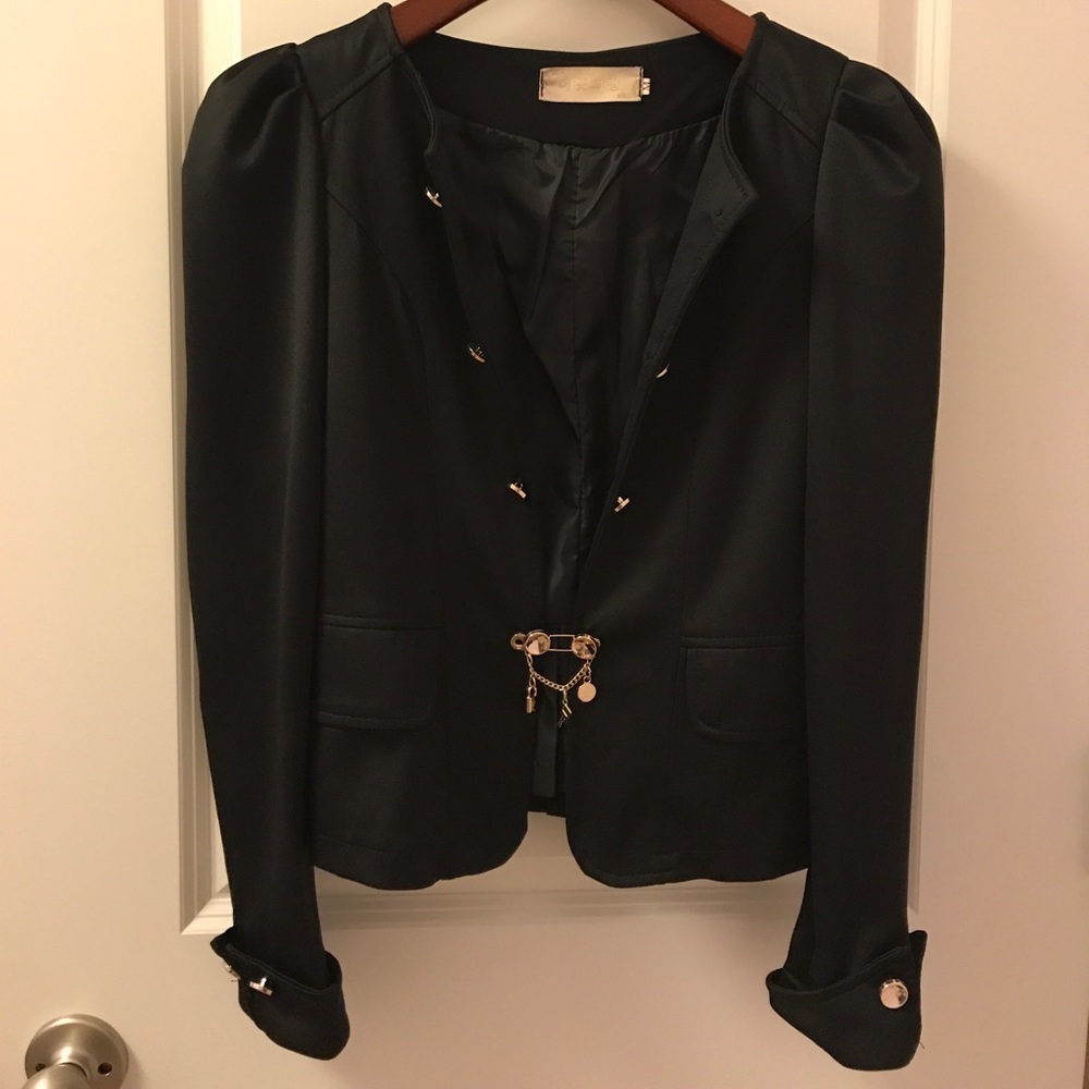 Super cute black jacket with bow in the back