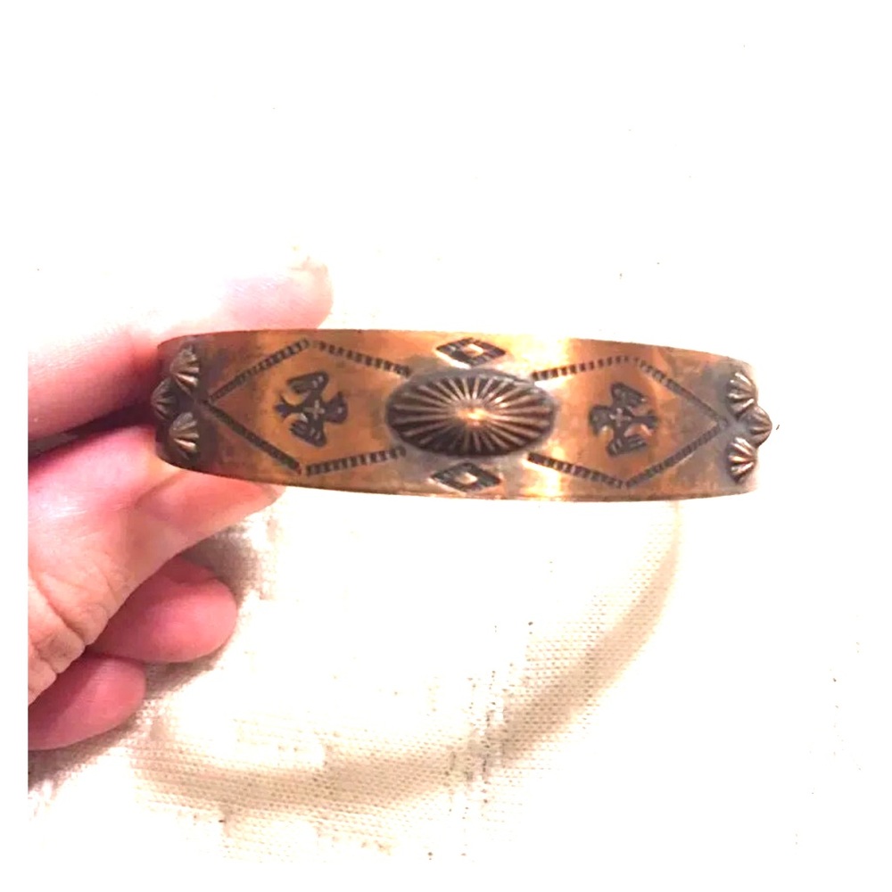 Ornate Copper Bracelet With Native Motifs