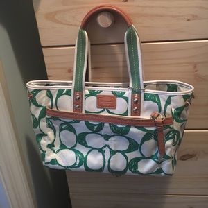 Green and white coach bag