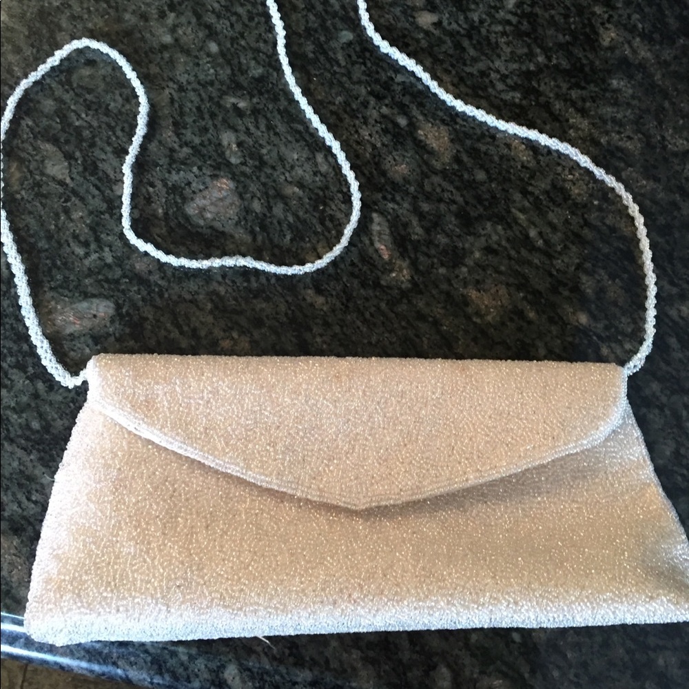 Beige evening clutch bag