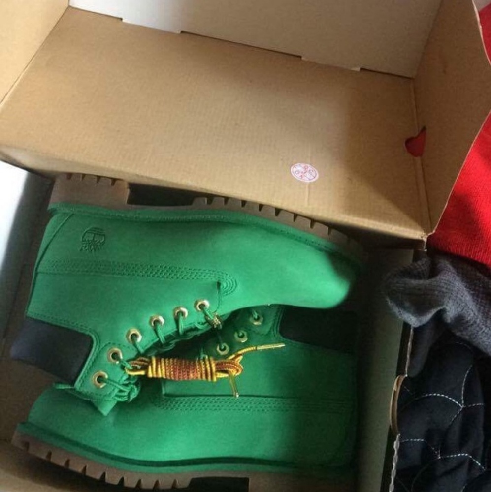 Two pairs of childrens boots acg and timberland