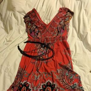 Exotic look with the pop of red.