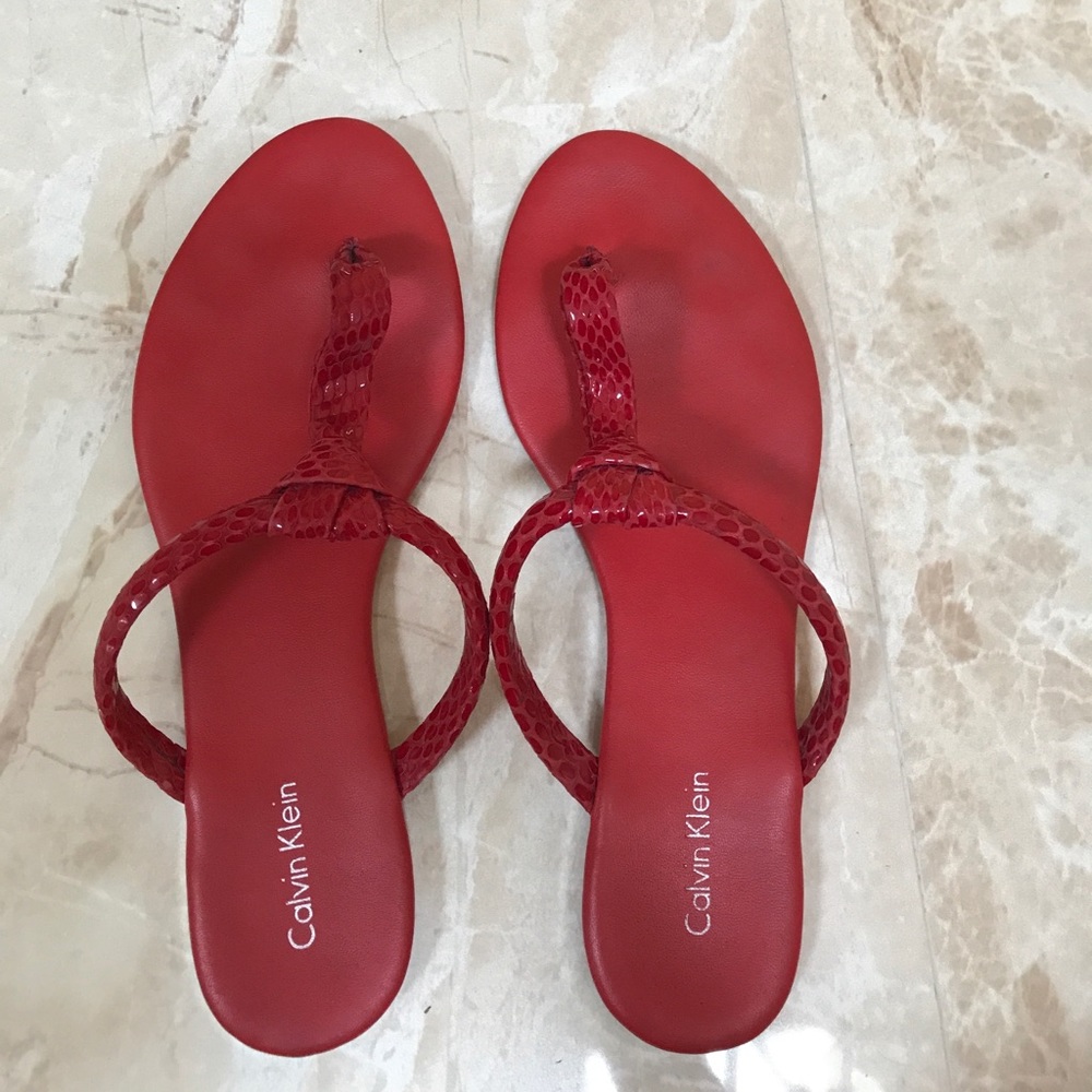 Calvin Klein red snake skin thong sandals