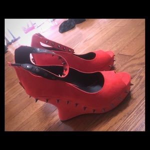 High heel red suede shoes with studs