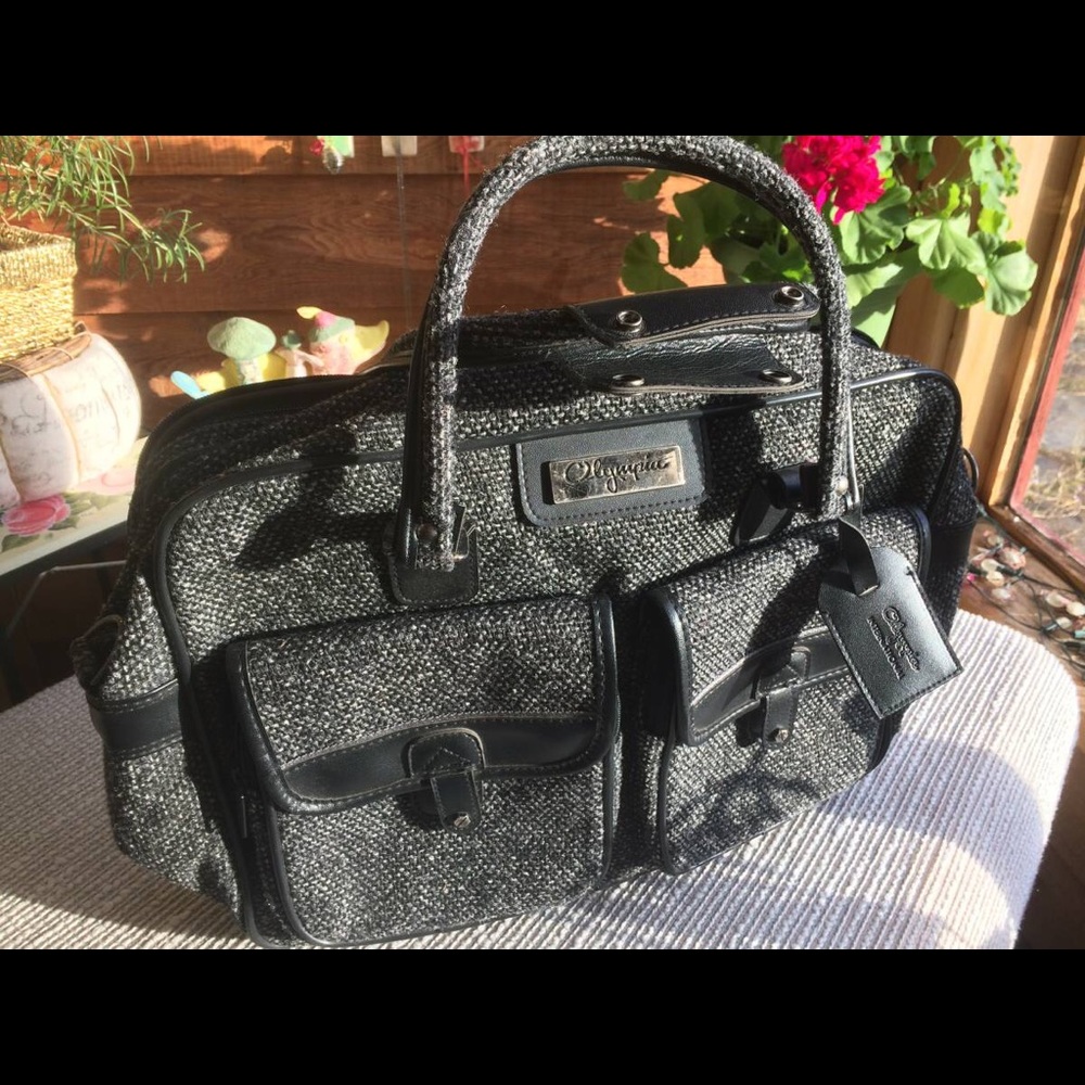 Black and grey tweed carry-on travel bag