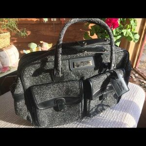 Black and grey tweed carry-on travel bag