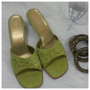 UNISA flower studded suede mule.