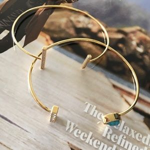 Set of two pave golden bracelets NWOTs.