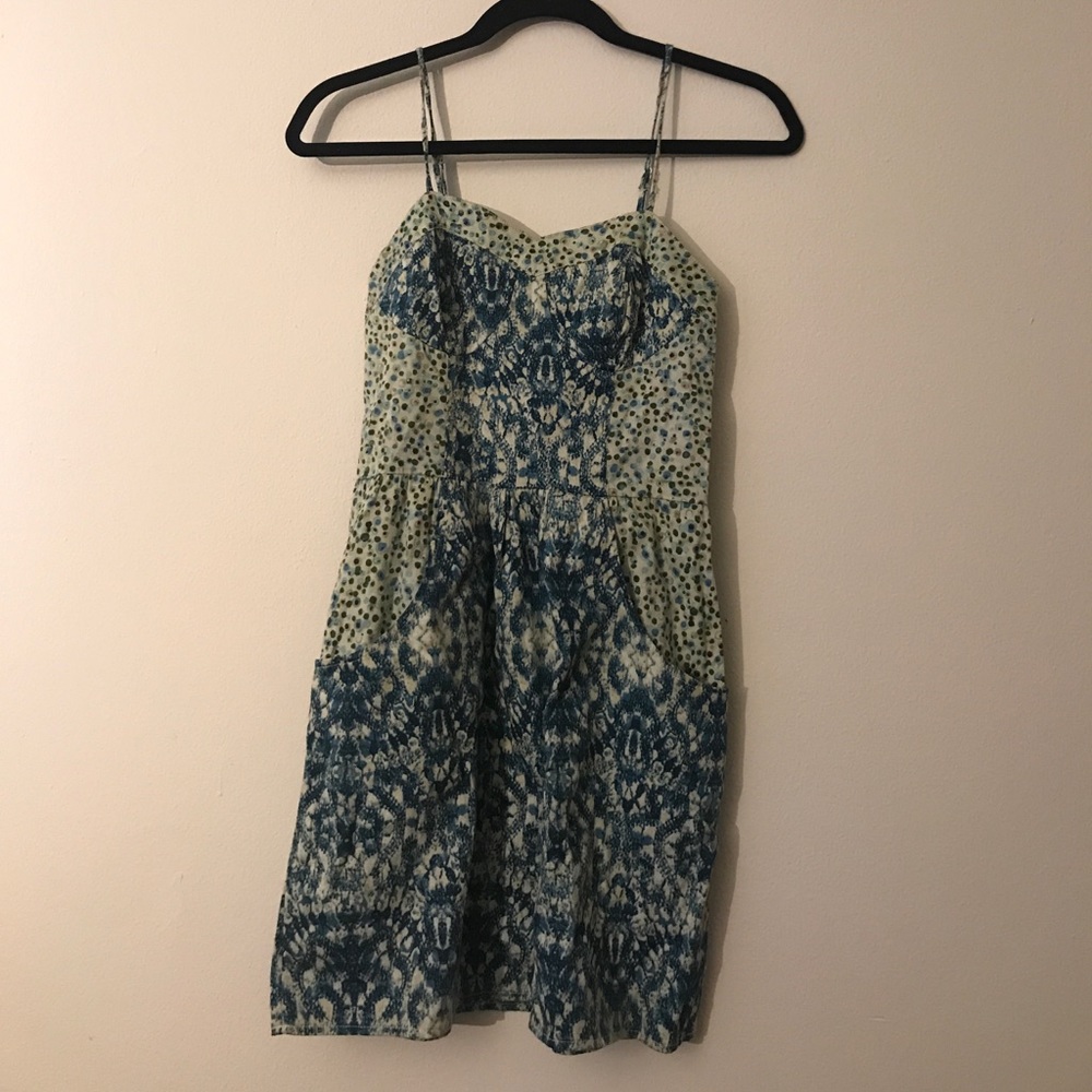 Spaghetti strap printed mini dress with pockets