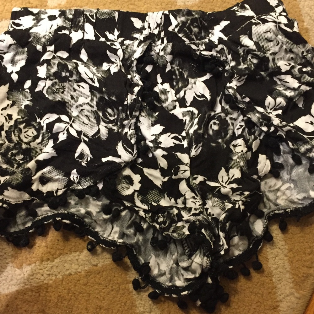 LF black and white rose patterned Pom Pom shorts