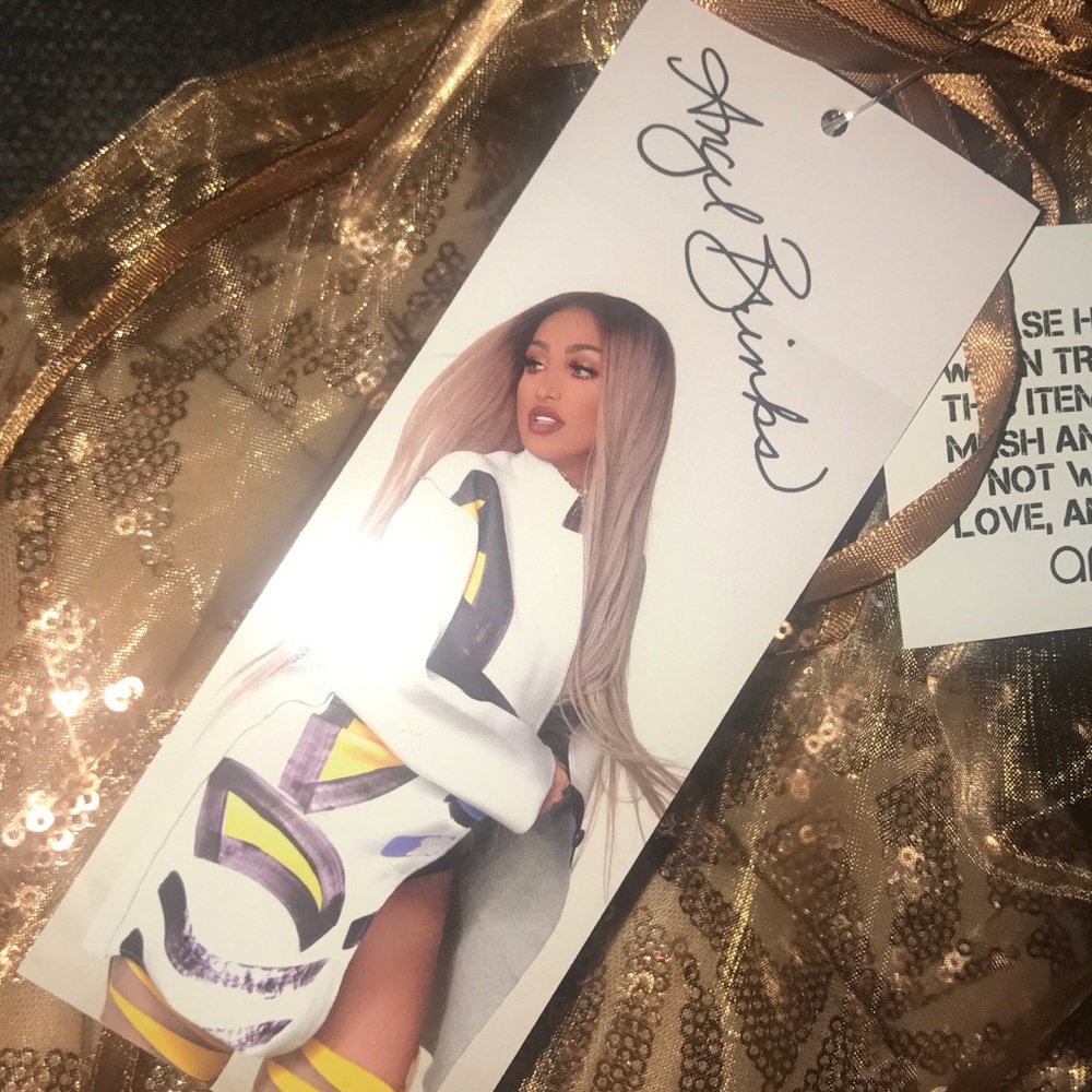 Brand new Angel brinks jumpsuit!!